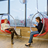 Оригинальное оформление офиса: подвесные кресла для отдыха сотрудников.